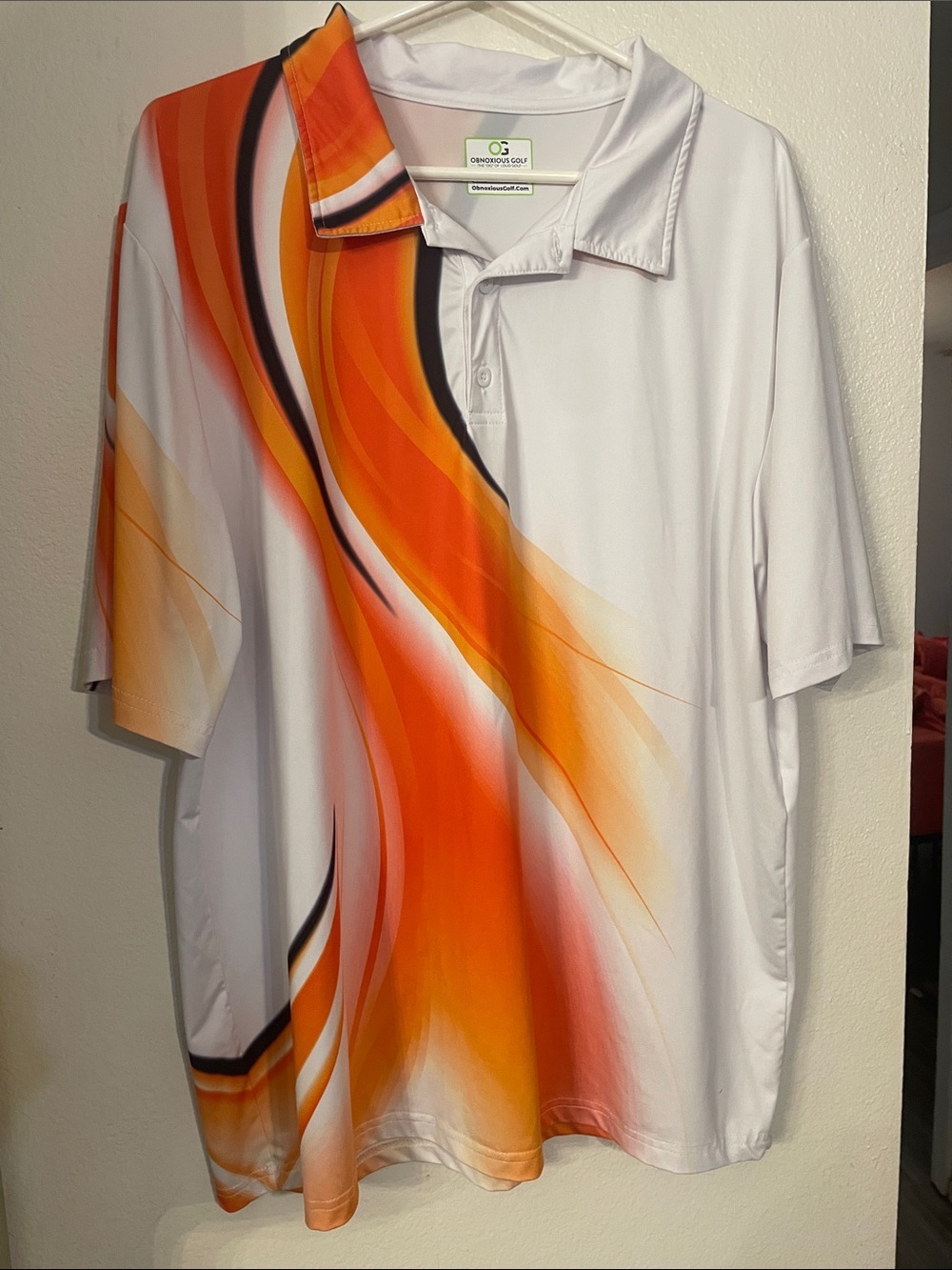 Men’s White Polo with Orange Wave Print
